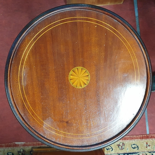 565 - An Edwardian Mahogany and Inlaid Plant stand.
D 36 x H 97 cm approx.