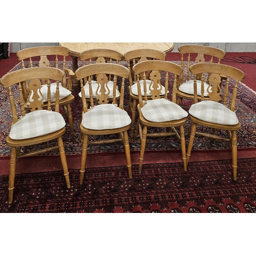 931 - A good set of eight Beech Windsor style Chairs.