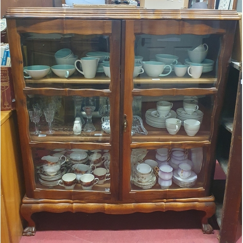 1284 - A good reproduction modern Mahogany two drawer Display Cabinet on ball and claw supports.
104 x 42 x... 