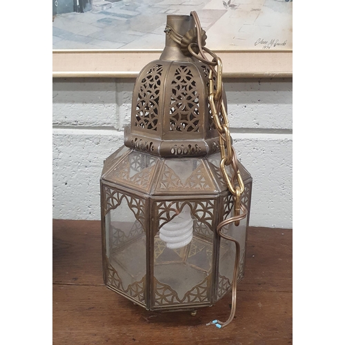 1286 - An Eastern style Brass Lantern. H 36 cm approx.