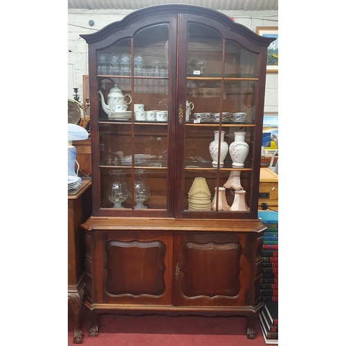 1301 - A good two door Display Cabinet with glazed upper and panel base. 115 x 42 x H 202 cm approx.