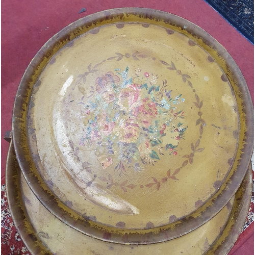 1307 - An early 20th Century tray top Foldup Table with two painted decorated trays. D 44 cm approx.