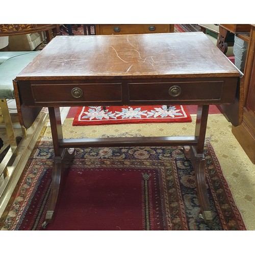 605 - A 19th Century Mahogany and Veneered Sofa Table of neat proportions with twin frieze drawers on spla... 