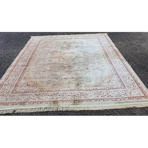 1276 - A green ground Carpet with multi borders and unique central medallion design.
L 396 x W 277 cm appro... 