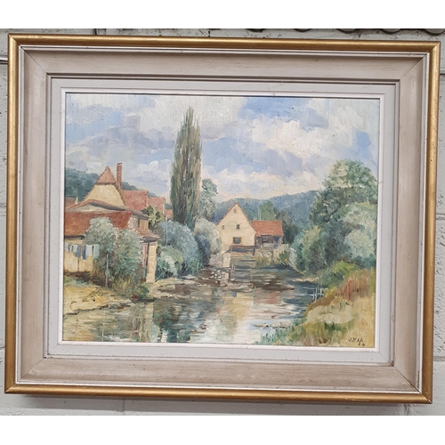 924 - A well framed 20th Century Oil on Board of a village river scene. Monogrammed LR. 40 x 50 cm approx.