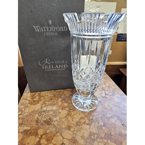 208 - A Waterford Crystal Vase from the Romance of Ireland Collection. D 13 x H 28 cm approx.