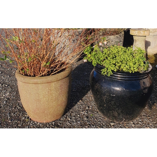 1411A - A large Black Ceramic Pot along with a stone effect pot.  H 43 x D 48 cm approx.