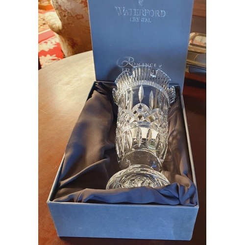 208 - A Waterford Crystal Vase from the Romance of Ireland Collection. D 13 x H 28 cm approx.