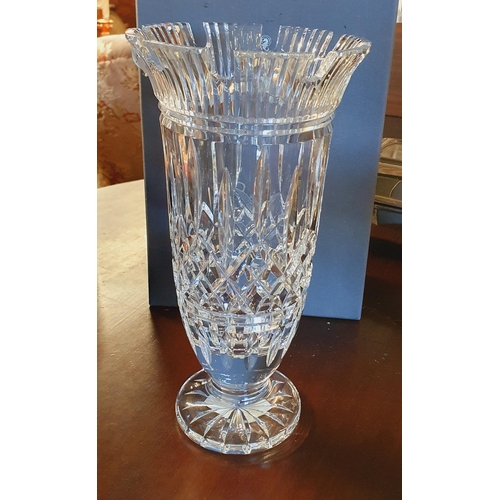 208 - A Waterford Crystal Vase from the Romance of Ireland Collection. D 13 x H 28 cm approx.