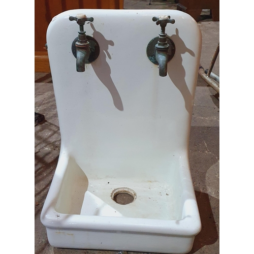 1433 - A retro Cast Iron and Enamel Boot room Sink along with a set of taps.
H 56 x W 40 x D 30 cm approx.