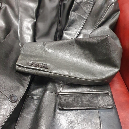 153 - A Hugo Boss Men's Jacket. Black Leather, size 50.
Pre-owned, excellent condition, Retails at €500 .