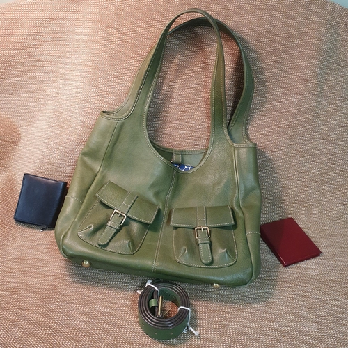 132 - A  Ladies Boden Green Leather Hand Bag and belt  to include two leather wallets . Pre owned, excelle... 