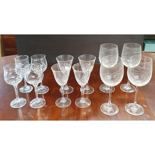 175 - A quantity of Pint Glasses along with wine glasses.