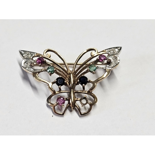 315 - A 9ct Gold and Gem set Broach in the form of a Butterfly.