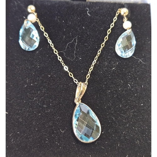 376 - A set of 9ct Gold, Topaz and Pearl to include a Pendant and a pair of drop Earrings.