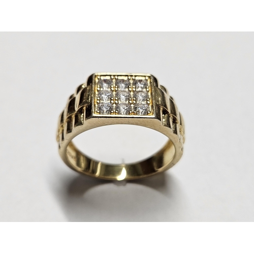 321 - A Silver Gilt Rolex Ring, size T.