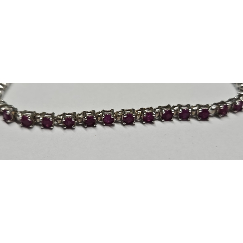 327 - A Silver and gem set Bracelet.