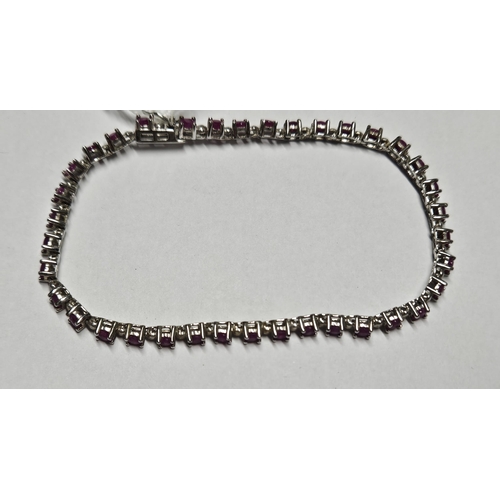 327 - A Silver and gem set Bracelet.