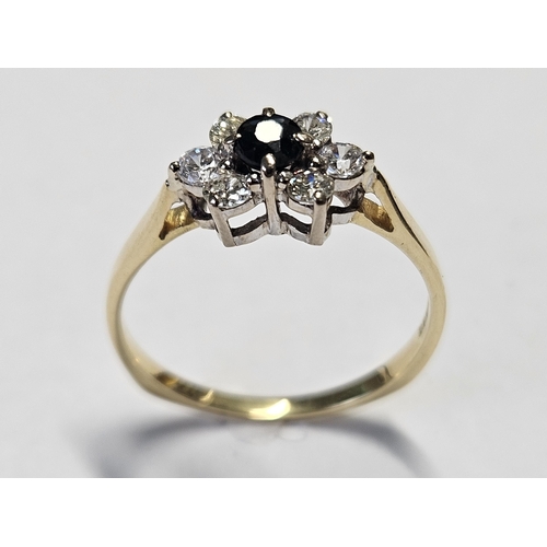 381 - An 18ct Gold, Diamond and Sapphire Ring, size N1/2.