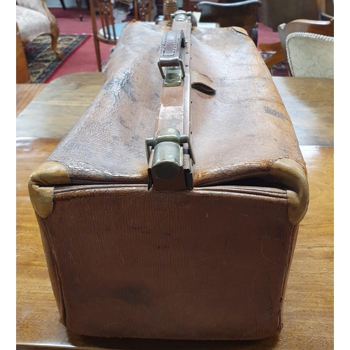 15 - An extremely large 19th Century brown leather Doctors Surgical Bag with brass fittings.
55 x 26 cm a... 