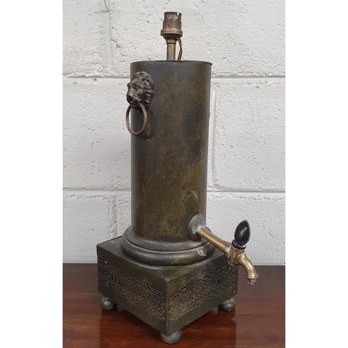 24 - A vintage Metal Chocolatier converted to a lamp with lions head lifting handles 36cm high.