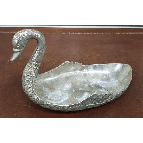 33 - A Silver Plate Centre Dish with grape detail along with a centre dish with swan outline. 
27 x 14 cm... 