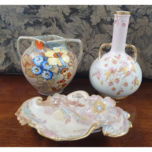 762 - A group of Royal Crown Devon ware to include a bottle vase, another vase and a centre dish.
D 14 x H... 