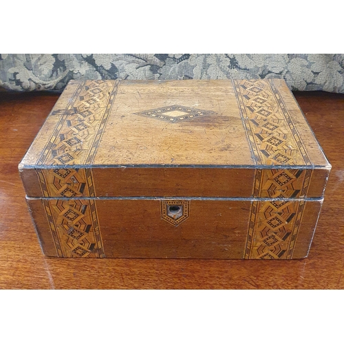 781 - A 19th Century Walnut Box with parquetry inlay.
W 28 x D 18 x H 13 cm approx.