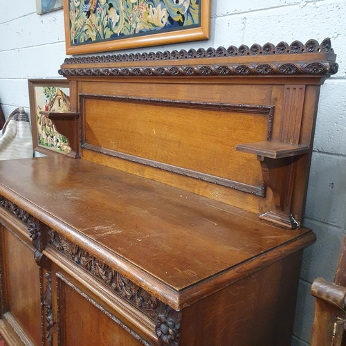 892 - Of Superb quality. A 19th Century Oak Side Cabinet with gallery back. 153 x 53 x H 148 cm approx.