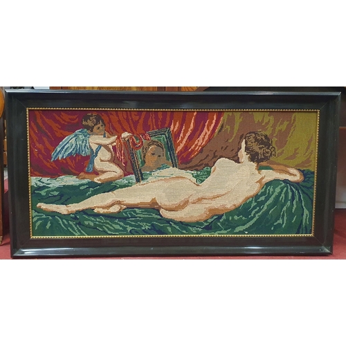 948 - A 20th Century Tapestry style tapestry of a naked woman looking into a mirror. In a good ebonised fr... 