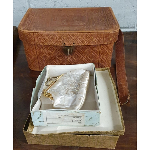 960 - A lovely embossed vintage Jewellery Box along with two vintage purses.