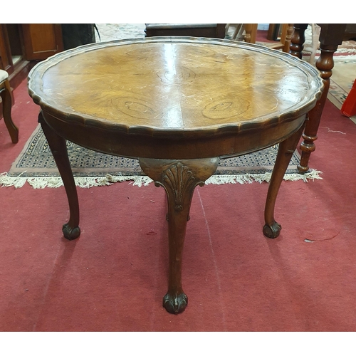 980 - A 19th Century Walnut and Veneered tray top Coffee Table with scalloped edge on carved cabriole ball... 