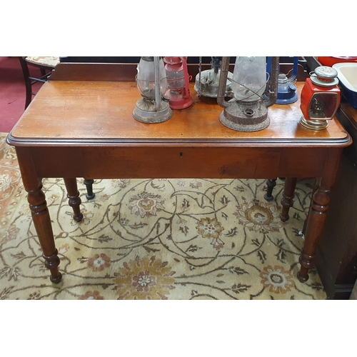 984 - A 19th Century Mahogany single drawer Side Table on turned supports. 113 x 47 x H 74 cm approx.