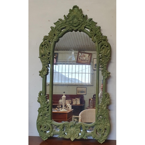 993 - A 20th Century highly carved Pier Mirror of good size painted Green, 161 x 85 cm approx.