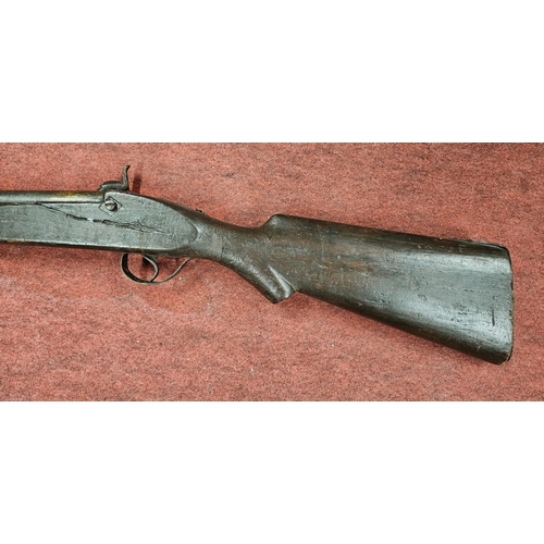 206 - An 18th Century - early 19th Century flint lock long barreled rifle, total length 135 cm approx.