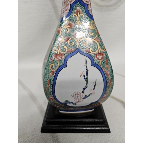 219 - A lovely early 20th Century Ceramic Lamp with hand painted panel decoration. 
37 x 14 cm approx.