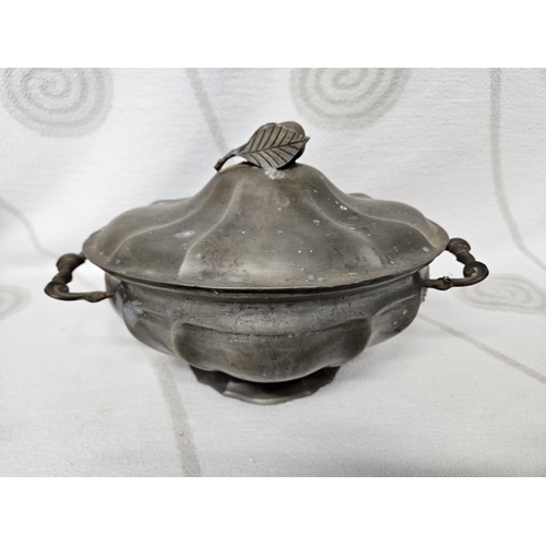 223 - A 19th Century Pewter centre Dish and Tray. 33 x 22 x 22 cm approx.