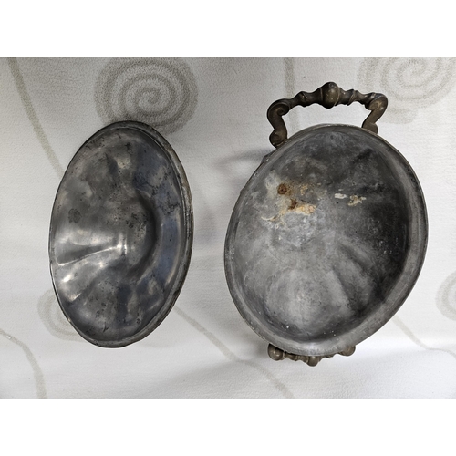 223 - A 19th Century Pewter centre Dish and Tray. 33 x 22 x 22 cm approx.