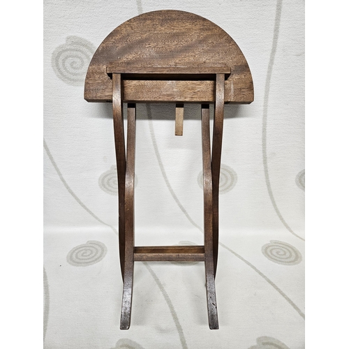 277 - A small Mahogany fold up Table. 40 diam x 54h cm approx.