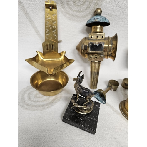 447 - A good quantity of Vintage Brassware to include two coaching Lamps, and other items.