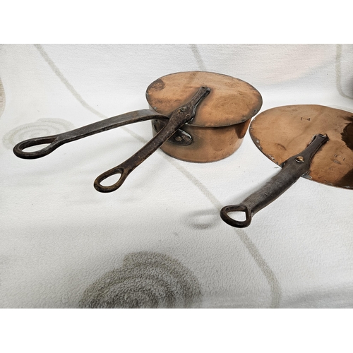 492 - Two 18th Century Copper Saucepans along with their lids and another lid. D 27, D 18 cm approx.