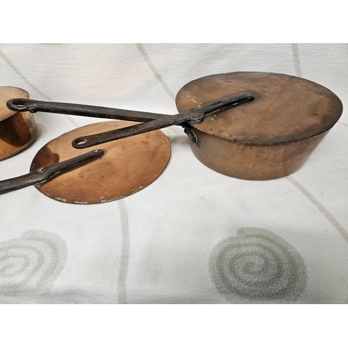 492 - Two 18th Century Copper Saucepans along with their lids and another lid. D 27, D 18 cm approx.