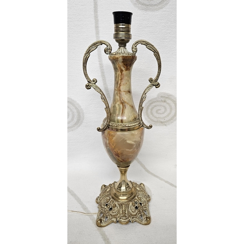 693 - A lovely Brass and Onyx table Lamp in the classical form. H 48 cm approx.