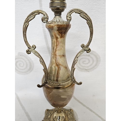 693 - A lovely Brass and Onyx table Lamp in the classical form. H 48 cm approx.