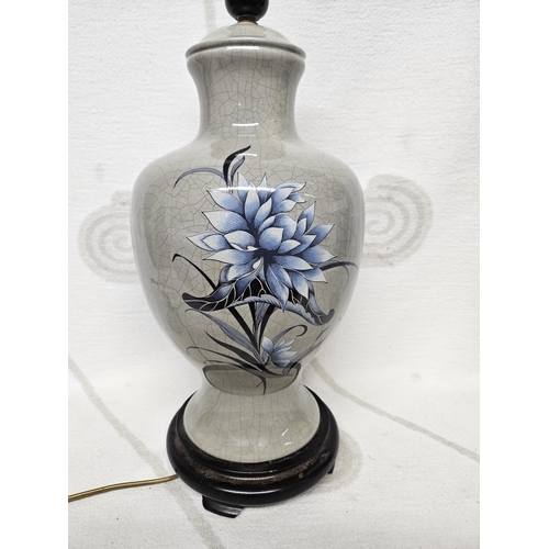 694 - A good Bulbous table Lamp with gray ground, hand painted floral decoration and crackle glaze.
H 45 c... 