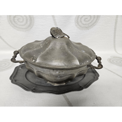 223 - A 19th Century Pewter centre Dish and Tray. 33 x 22 x 22 cm approx.