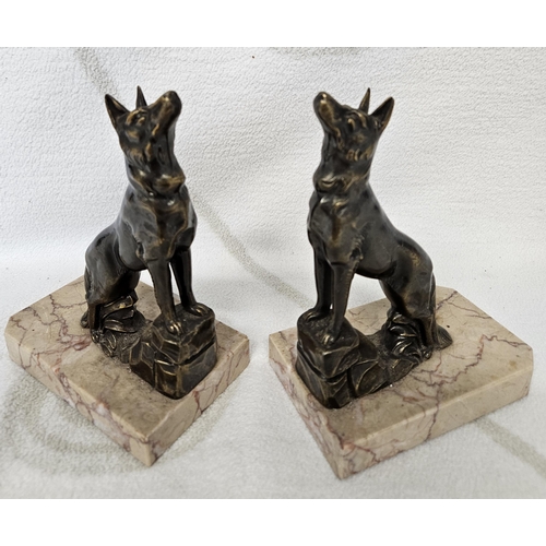 273 - A lovely pair of Metal and Marble Bookends depicting a pair of Alsatians standing in an upright posi... 