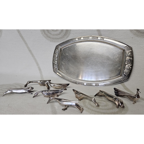 43 - A quantity of Silver plated knife Rests depicting various animals along with a Silver plated Tray an... 