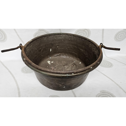 49 - A good large Copper Cauldron with cast iron Handle. 47 x 24 cm approx.