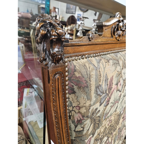 57 - A Fabulous 19th Century Walnut Hall Chair with lions head supports and tapestry style upholstery wit... 